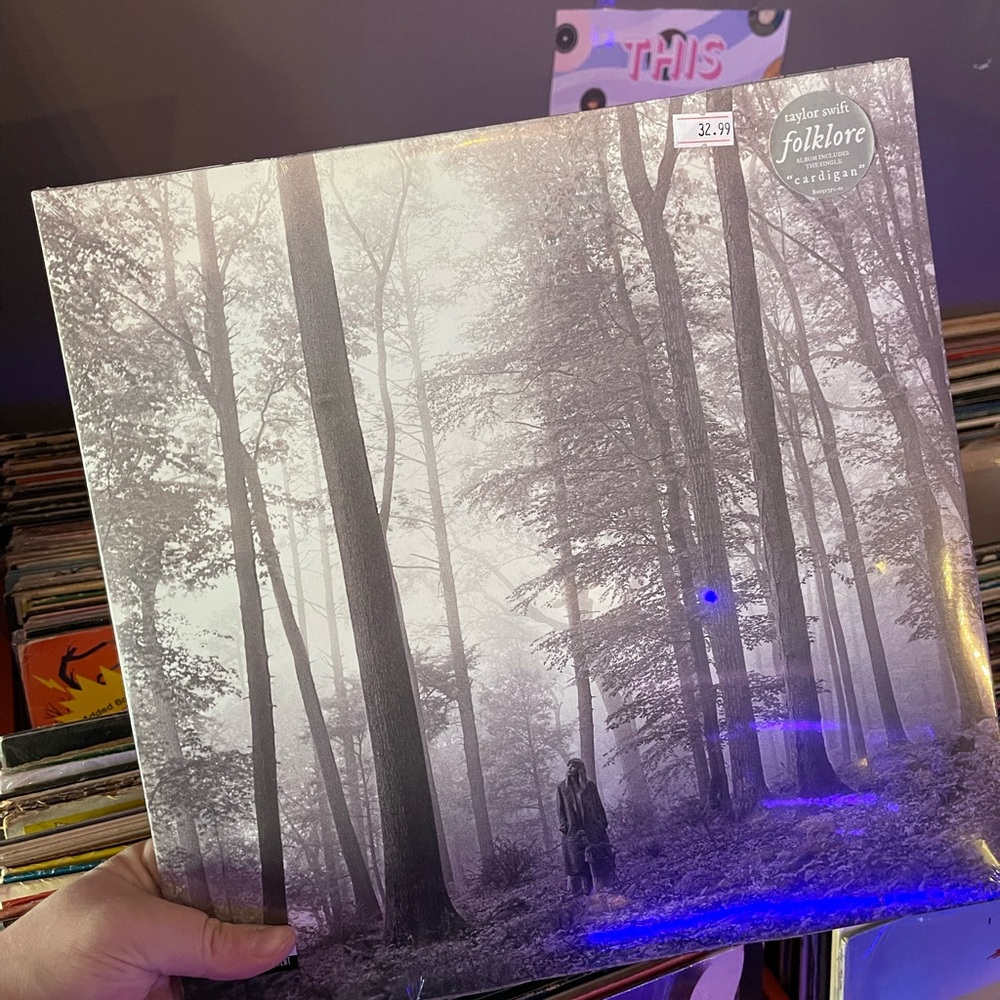 Taylor Swift Folklore Album with Gray and Black Cover